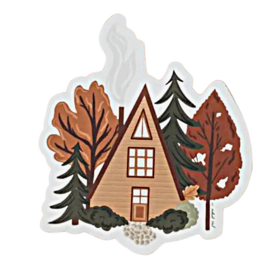 A-Frame Cabin in the Woods Sticker. Pine trees surround a cozy cabin in the forest